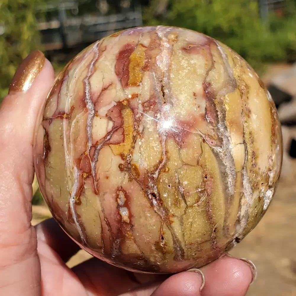 Pink Ocean Ibis Jasper Brecciated Sphere w/ Caves Druzy 458 grams 71mm